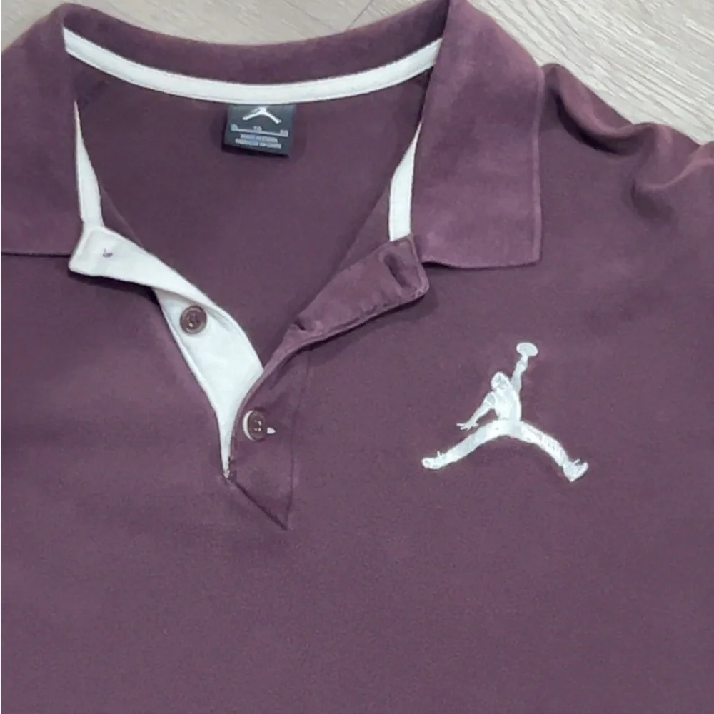 Nike Jordan Team men's golf polo shirt in a burgundy color